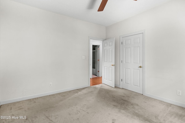 163 Middleton Dr, Hertford, NC 27944 - unfurnished bedroom featuring ceiling fan, carpet flooring, and baseboards