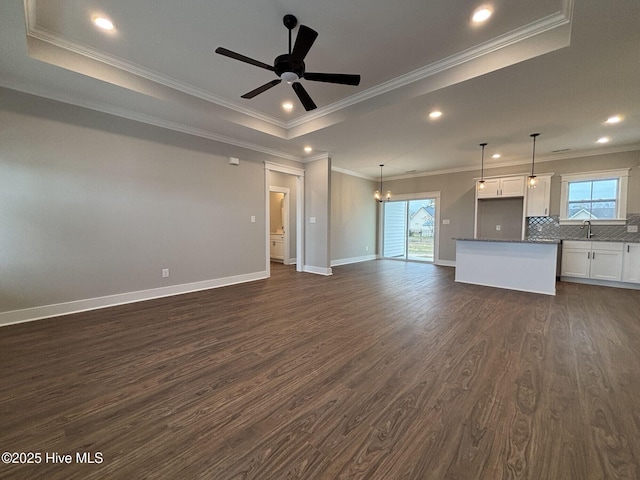 203 Crown Dr, Washington, NC 27889 - unfurnished living room with recessed lighting, plenty of natural light, and dark wood-type flooring