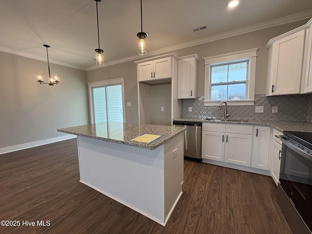 203 Crown Dr, Washington, NC 27889 - kitchen with visible vents, appliances with stainless steel finishes, a sink, light stone counters, and dark wood-type flooring