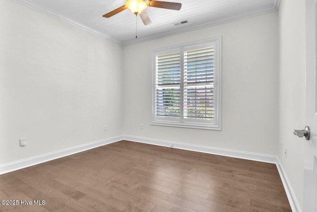 661 Jenoa Loop, Castle Hayne, NC 28429 - spare room with a ceiling fan, dark wood-type flooring, crown molding, and baseboards
