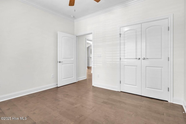 661 Jenoa Loop, Castle Hayne, NC 28429 - unfurnished bedroom with crown molding, wood finished floors, baseboards, a closet, and ceiling fan