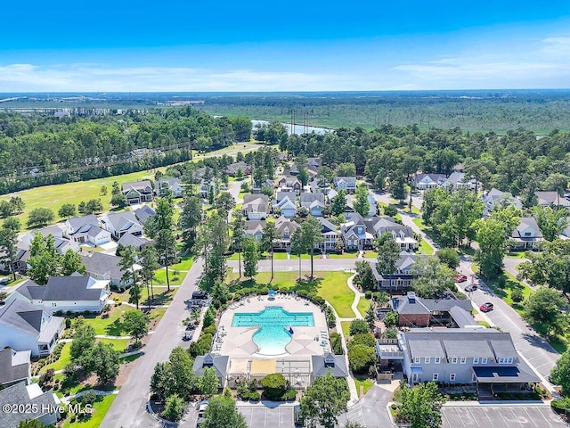 661 Jenoa Loop, Castle Hayne, NC 28429 - aerial perspective of suburban area with a pool and a forest