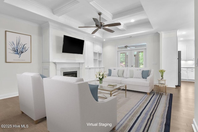 661 Jenoa Loop, Castle Hayne, NC 28429 - living area featuring a ceiling fan, wood finished floors, ornamental molding, french doors, and beam ceiling
