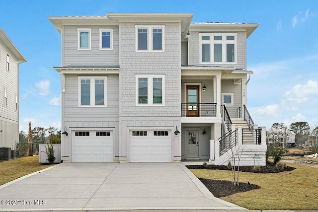 1637 Riverview Ter Unit 61, Wilmington, NC 28401 - raised beach house featuring a garage, a front yard, driveway, and stairway