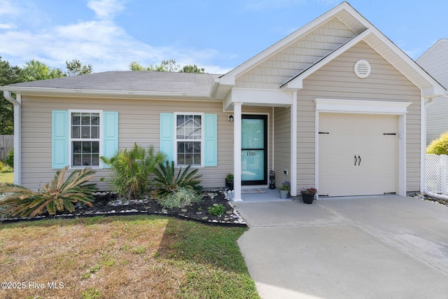 1516 Round Ridge Rd SE, Bolivia, NC 28422 - ranch-style house featuring a garage and concrete driveway