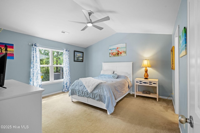 1516 Round Ridge Rd SE, Bolivia, NC 28422 - bedroom with light colored carpet, baseboards, vaulted ceiling, and visible vents