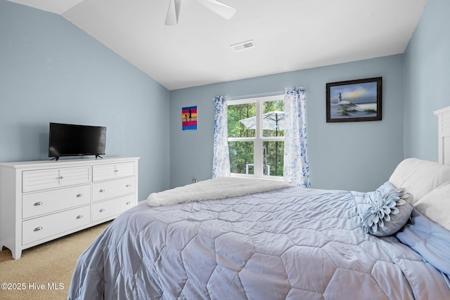 1516 Round Ridge Rd SE, Bolivia, NC 28422 - bedroom with visible vents, a ceiling fan, vaulted ceiling, and light colored carpet