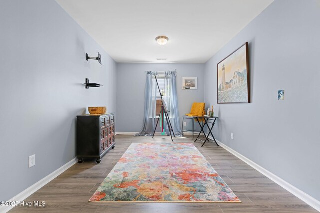 1516 Round Ridge Rd SE, Bolivia, NC 28422 - interior space with baseboards and wood finished floors
