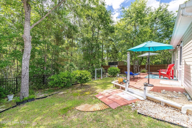 1516 Round Ridge Rd SE, Bolivia, NC 28422 - view of yard with a fenced backyard and a patio