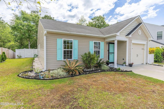 1516 Round Ridge Rd SE, Bolivia, NC 28422 - view of front of home featuring fence, a front yard, a gate, an attached garage, and driveway