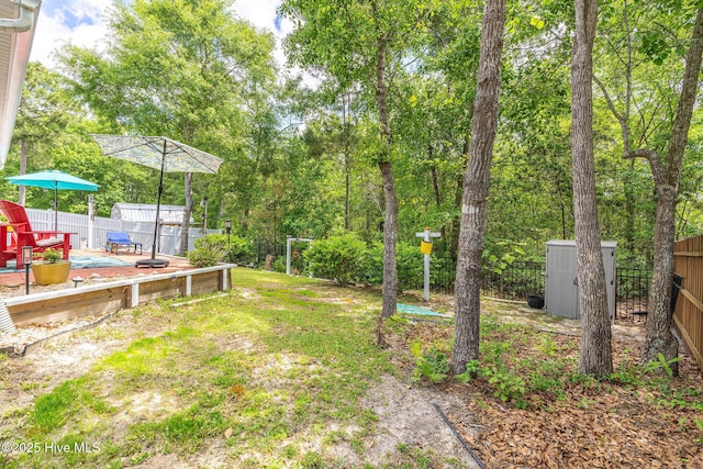 1516 Round Ridge Rd SE, Bolivia, NC 28422 - view of yard with an outbuilding, a shed, and a fenced backyard