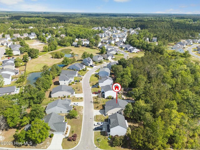 1516 Round Ridge Rd SE, Bolivia, NC 28422 - birds eye view of property with a forest view, a water view, and a residential view