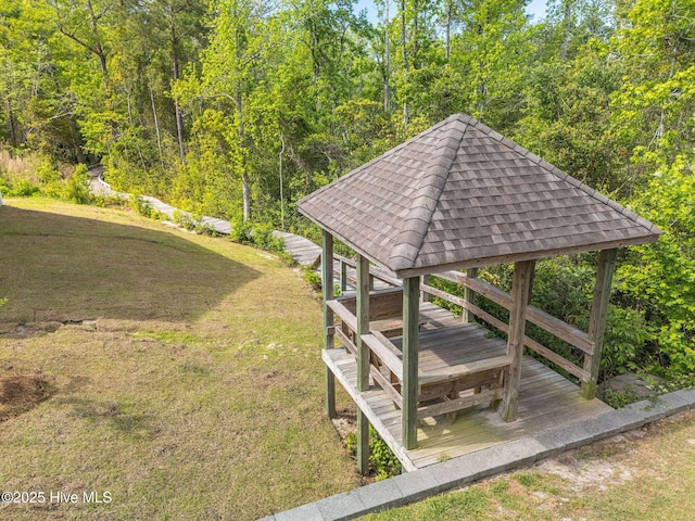 1516 Round Ridge Rd SE, Bolivia, NC 28422 - view of home's community featuring a view of trees, a wooden deck, a gazebo, and a yard