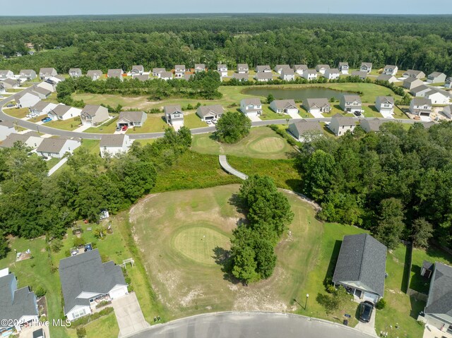1516 Round Ridge Rd SE, Bolivia, NC 28422 - birds eye view of property featuring a forest view, a residential view, and golf course view