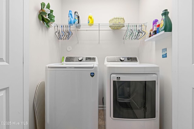 1516 Round Ridge Rd SE, Bolivia, NC 28422 - clothes washing area with washing machine and clothes dryer and laundry area