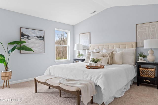 5034 Northstar Dr Unit 68, Leland, NC 28451 - carpeted bedroom featuring lofted ceiling, visible vents, and baseboards