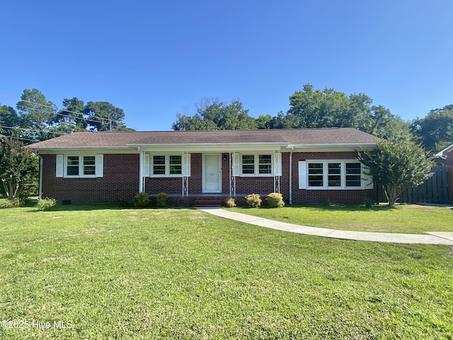 101 N Channel Haven Dr, Wilmington, NC 28409 - ranch-style home featuring brick siding and a front yard