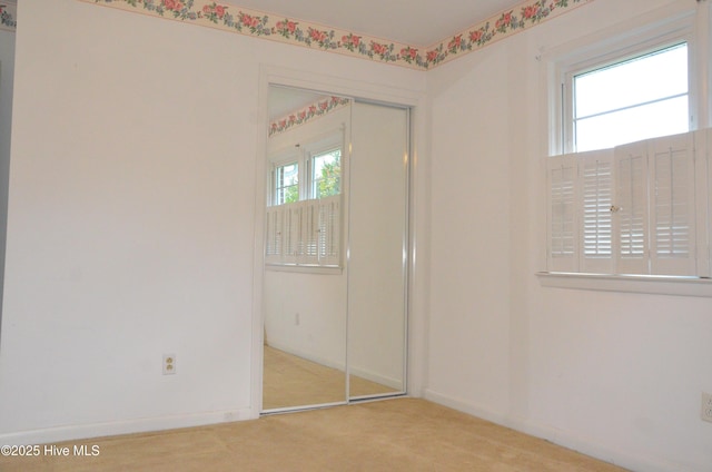101 N Channel Haven Dr, Wilmington, NC 28409 - spare room featuring light colored carpet and baseboards