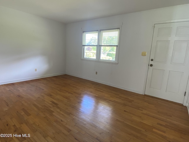 101 N Channel Haven Dr, Wilmington, NC 28409 - spare room featuring wood finished floors and baseboards