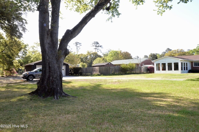 101 N Channel Haven Dr, Wilmington, NC 28409 - view of yard with a garage and concrete driveway