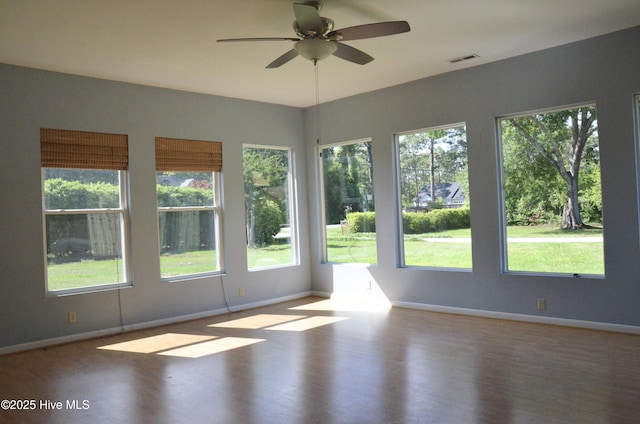 101 N Channel Haven Dr, Wilmington, NC 28409 - unfurnished room featuring a ceiling fan, wood finished floors, and baseboards