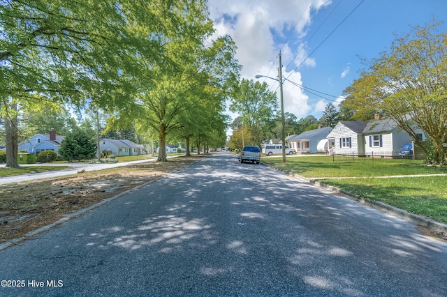1111 W Williams Cir, Elizabeth City, NC 27909 - view of street with a residential view, curbs, and street lighting