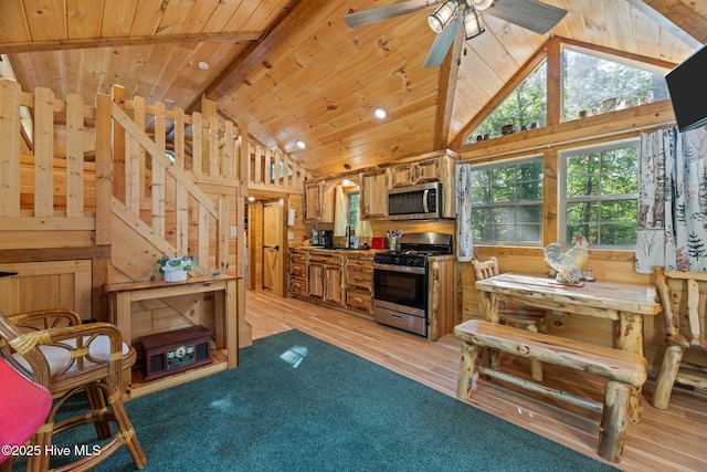 280 Charlie Rd, Arapahoe, NC 28510 - kitchen featuring ceiling fan, appliances with stainless steel finishes, lofted ceiling with beams, light wood-style flooring, and wooden ceiling
