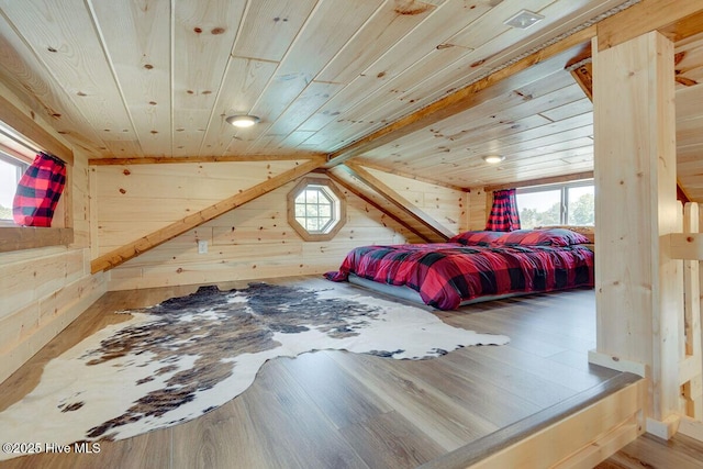 280 Charlie Rd, Arapahoe, NC 28510 - bedroom with wooden ceiling, wooden walls, wood finished floors, and lofted ceiling