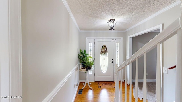 106 Ehrhardt Way, Princeton, NC 27569 - entrance foyer featuring crown molding, a textured ceiling, and wood finished floors