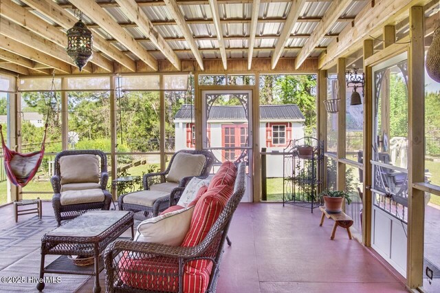 sunroom / solarium with an outdoor hangout area