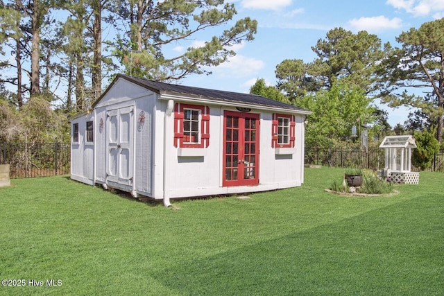view of shed featuring a fenced backyard