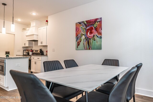 102 Dartmoor Ln, West End, NC 27376 - dining space with recessed lighting, dark wood-style floors, and baseboards