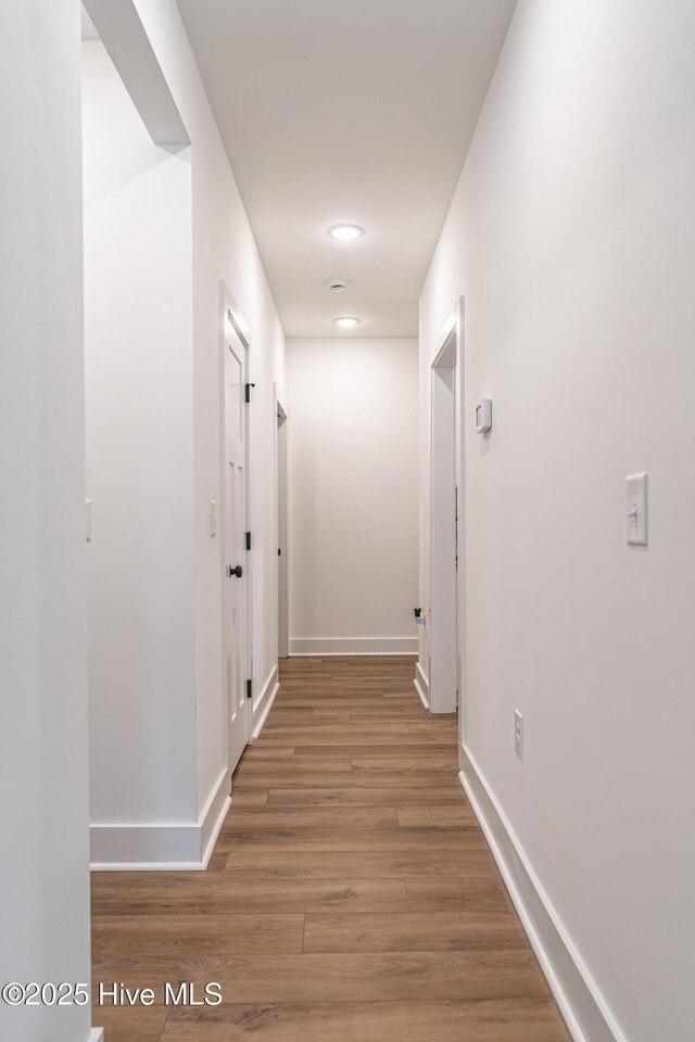 102 Dartmoor Ln, West End, NC 27376 - hall featuring wood finished floors, recessed lighting, and baseboards
