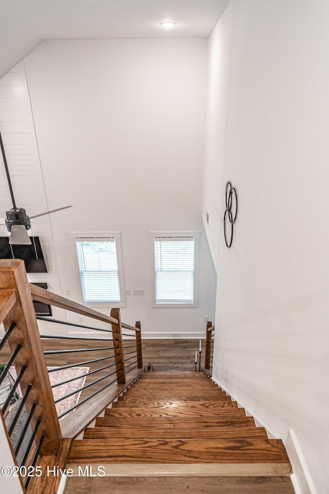 102 Dartmoor Ln, West End, NC 27376 - stairs with wood finished floors and high vaulted ceiling
