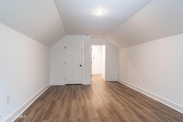 102 Dartmoor Ln, West End, NC 27376 - additional living space featuring vaulted ceiling, wood finished floors, and baseboards
