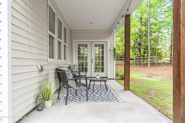 102 Dartmoor Ln, West End, NC 27376 - view of patio / terrace featuring fence and french doors
