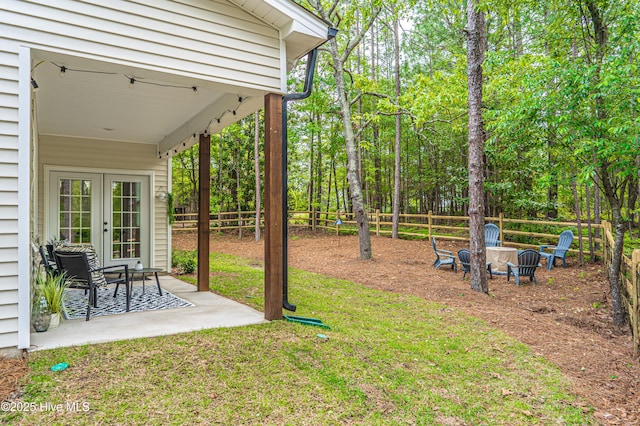 102 Dartmoor Ln, West End, NC 27376 - view of yard with a patio, a fire pit, french doors, and fence private yard