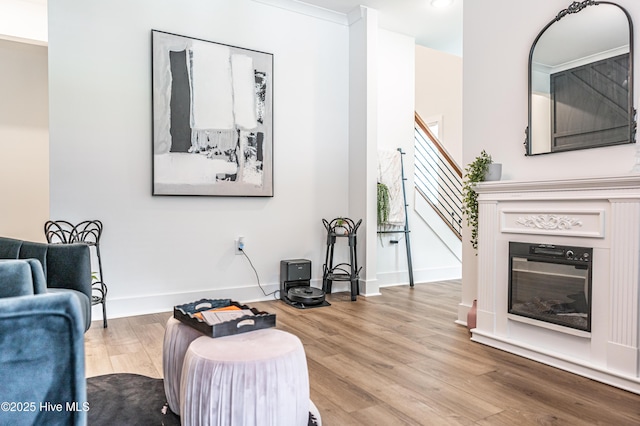 102 Dartmoor Ln, West End, NC 27376 - living room featuring stairway, wood finished floors, and baseboards