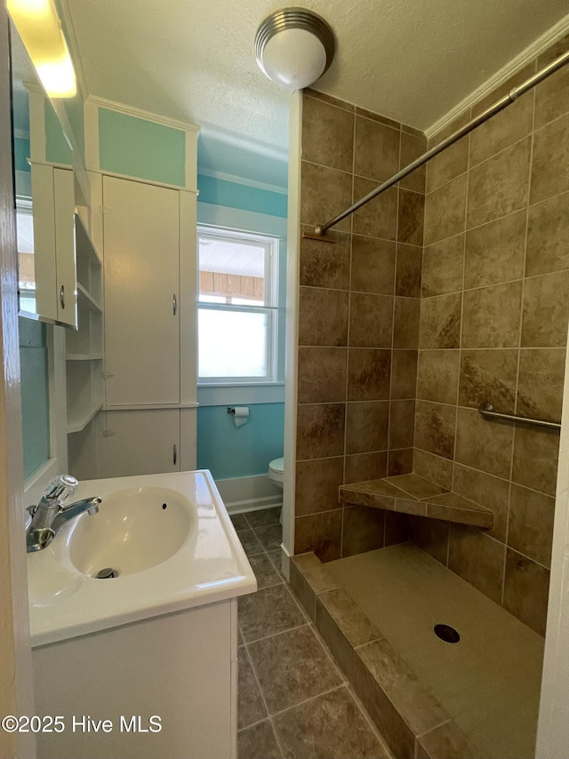 469 Lamont St, Belhaven, NC 27810 - bathroom with tile patterned floors, toilet, vanity, and a stall shower