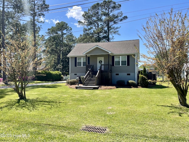 469 Lamont St, Belhaven, NC 27810 - view of front of house featuring a shingled roof, a front yard, and crawl space