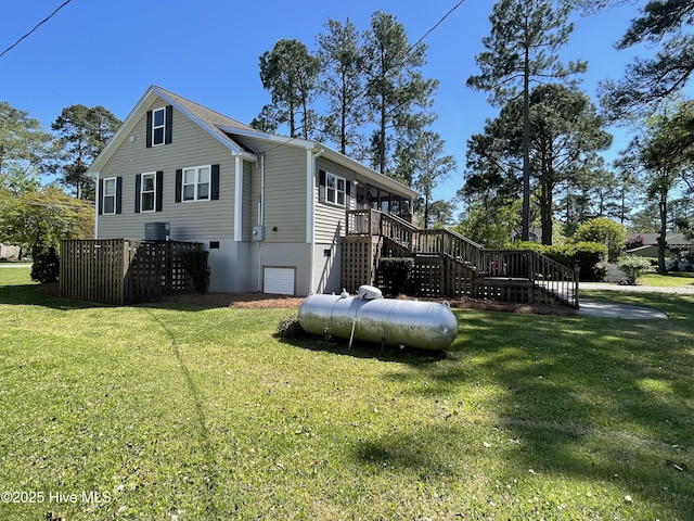 469 Lamont St, Belhaven, NC 27810 - view of side of property featuring a yard, stairs, and a deck