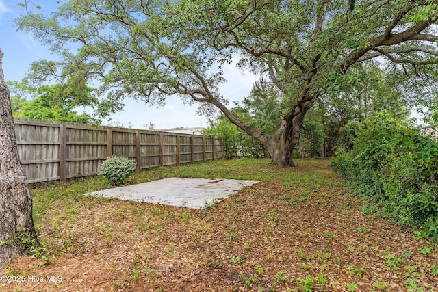 822 N Lord St, Southport, NC 28461 - view of yard featuring a patio and fence
