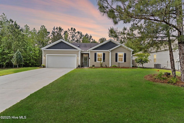 1699 Haldon Ln SE, Bolivia, NC 28422 - single story home featuring a garage, cooling unit, driveway, and a front yard