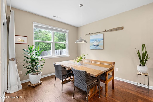 1699 Haldon Ln SE, Bolivia, NC 28422 - dining room featuring baseboards, visible vents, and dark wood-type flooring