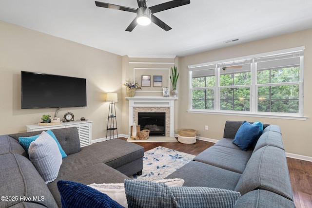 1699 Haldon Ln SE, Bolivia, NC 28422 - living room with visible vents, baseboards, ceiling fan, and dark wood-style floors