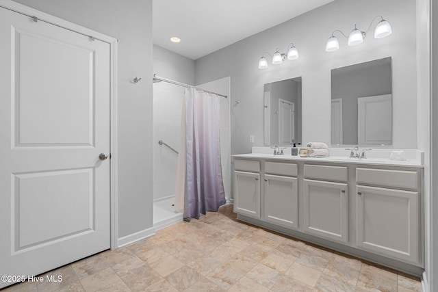1699 Haldon Ln SE, Bolivia, NC 28422 - full bathroom with a sink, a shower with curtain, and double vanity