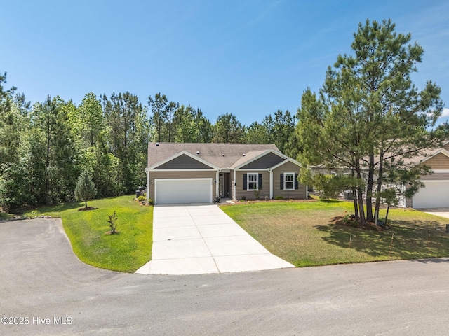 1699 Haldon Ln SE, Bolivia, NC 28422 - ranch-style house featuring an attached garage, driveway, and a front lawn