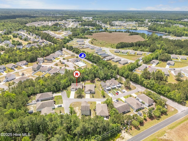 1699 Haldon Ln SE, Bolivia, NC 28422 - aerial view with a water view, a residential view, and a forest view