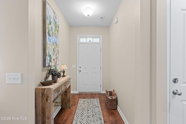 1699 Haldon Ln SE, Bolivia, NC 28422 - doorway to outside with baseboards, dark wood finished floors, and visible vents