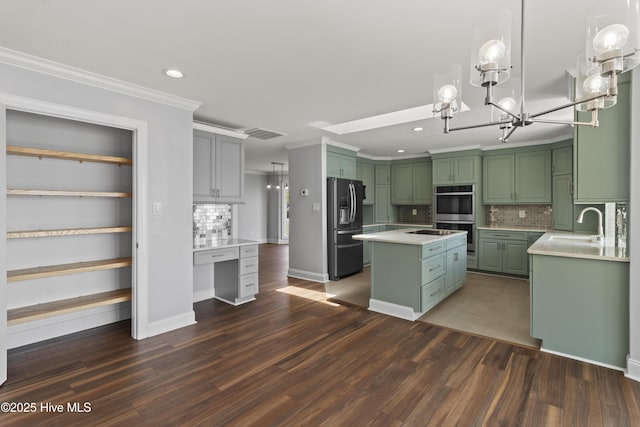 995 Chadwick Shores Dr, Sneads Ferry, NC 28460 - kitchen with refrigerator with ice dispenser, green cabinets, stainless steel double oven, a center island, and recessed lighting
